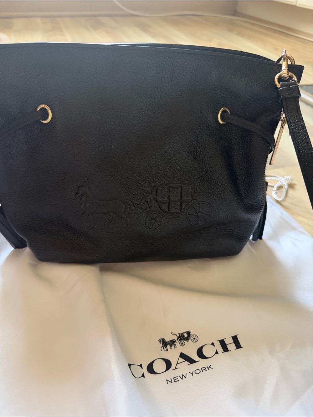 COACH Black Leather Shoulder Bag with Embossed Carriage